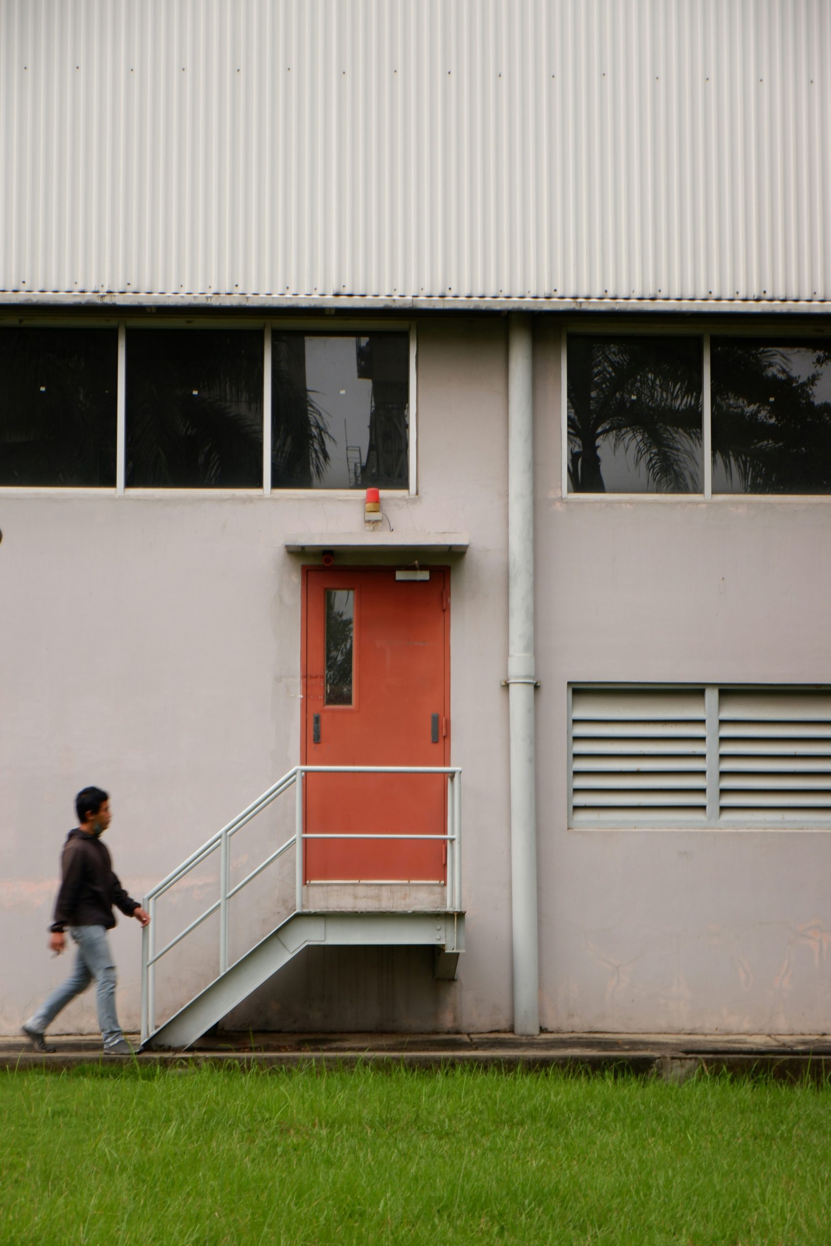 worker walking towards door